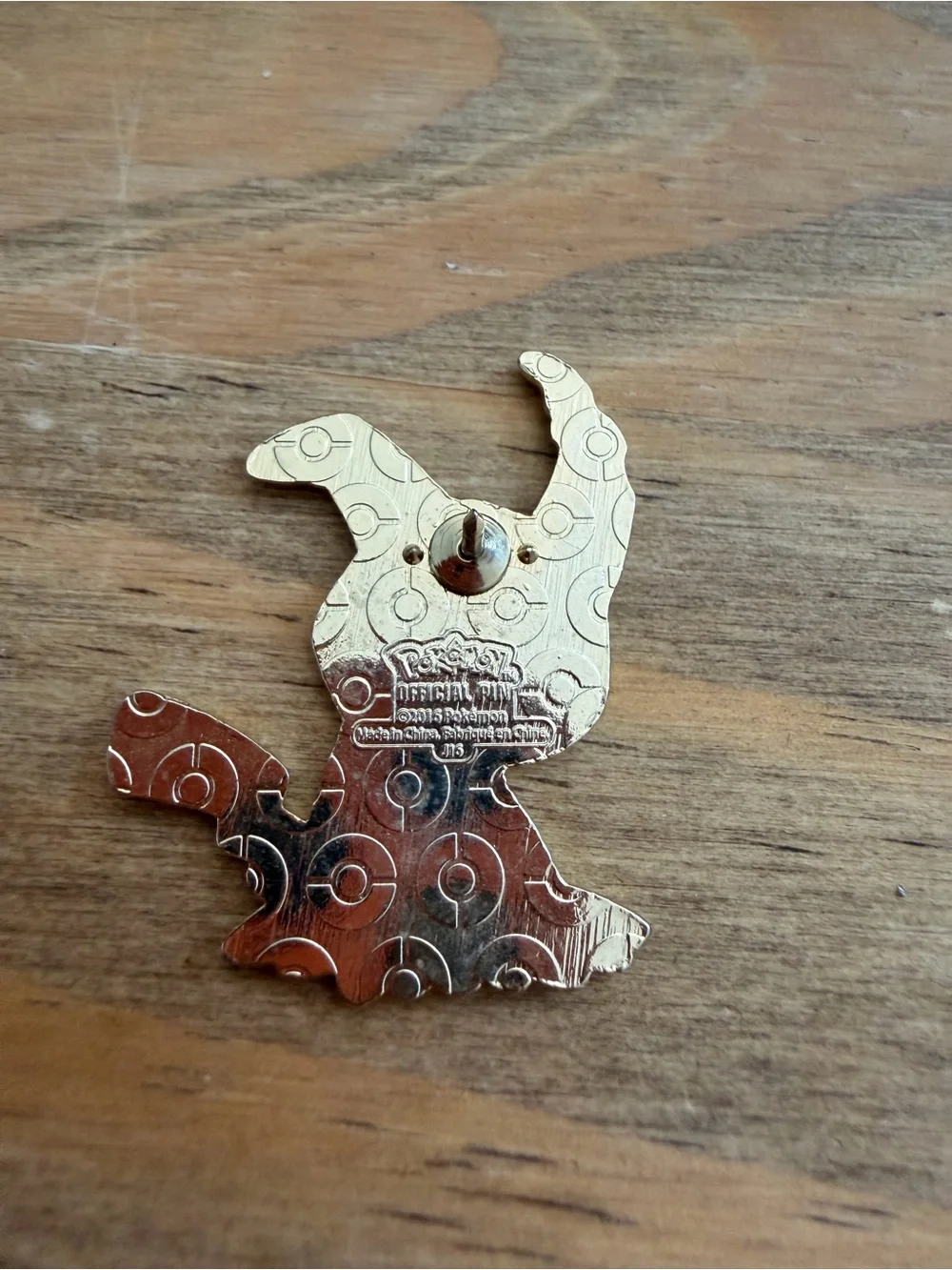 Pokemon Mimikyu Yellow Enamel Pin with Black & Orange Accents